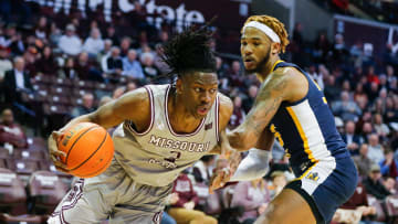 Missouri States Jonathan Mogbo drives to the basket as the Bears take on the Murray State Racers at Great Southern Bank Arena on Tuesday, Feb. 21, 2023.

Tmsu Basketball00186