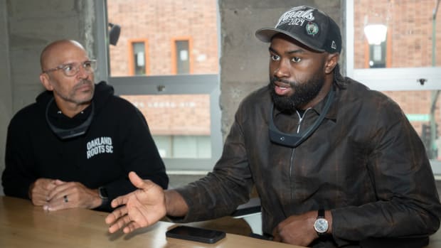 Jason Kidd (left) sits next to Jaylen Brown (right) as the two discuss The XChange at the launch of the Oakland XChange.