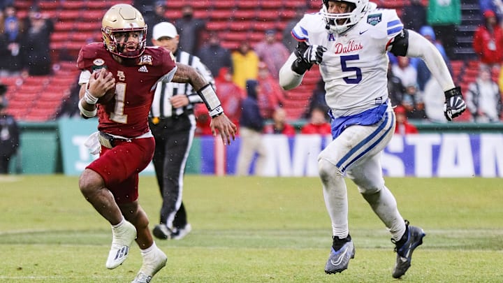 Boston College's Thomas Castellanos carries the ball during the second annual Wasabi Fenway Bowl vs. SMU at Fenway Park on Thursday, Dec. 28, 2023.