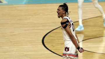 Apr 5, 2025; San Antonio, TX, USA; Auburn Tigers guard Chad Baker-Mazara (10) reacts after a play against the Florida Gators during the first half in the semifinals of the men's Final Four of the 2025 NCAA Tournament at Alamodome. Mandatory Credit: Scott Wachter-Imagn Images

