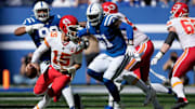Kansas City Chiefs quarterback Patrick Mahomes (15) scrambles out of the pocket while being pressured by Indianapolis Colts defenders Sunday, Sept. 25, 2022, during a game against the Kansas City Chiefs at Lucas Oil Stadium in Indianapolis.