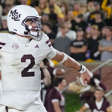 Mississippi State Bulldogs quarterback Blake Shapen (2) celebrates after scoring a touchdown against the Missouri Tigers during the second half of the game at Faurot Field at Memorial Stadium.