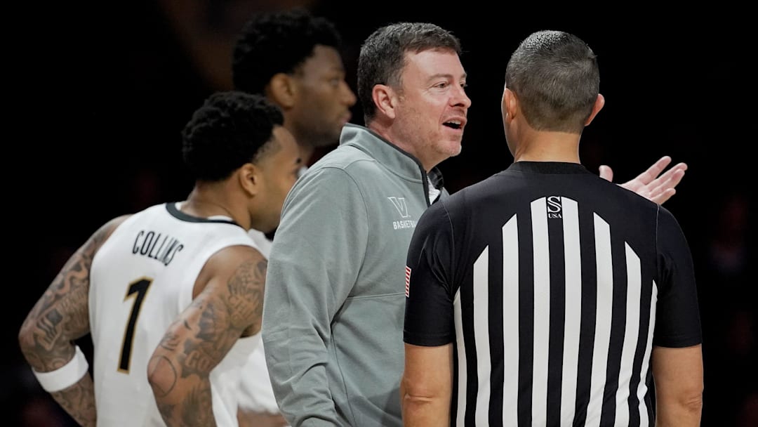 Vanderbilt head coach Mark Byington talks with an official during the second half of an NCAA college basketball game against SMU Wednesday, Dec. 3, 2025, in Nashville, Tenn. Vanderbilt head coach Mark Byington talks with an official during the second half of an NCAA college basketball game against SMU Wednesday, Dec. 3, 2025, in Nashville, Tenn.