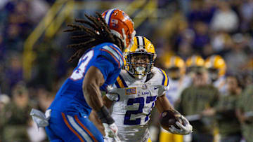 Nov 11, 2023; Baton Rouge, Louisiana, USA;  Florida Gators cornerback Jaydon Hill (23) chases down LSU Tigers running back Josh Williams (27) during the second half at Tiger Stadium. Mandatory Credit: Stephen Lew-Imagn Images