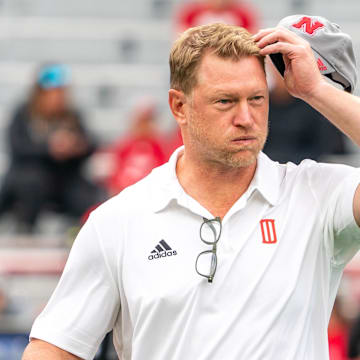 Former Nebraska Cornhuskers head coach Scott Frost walks on the field before a game against the Georgia Southern Eagles at Memorial Stadium.