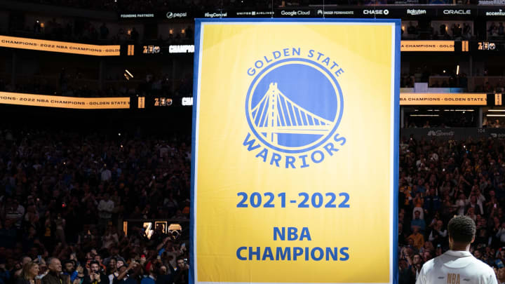 October 18, 2022; San Francisco, California, USA; Golden State Warriors guard Stephen Curry (30) watches the championship banner being raised before the game against the Los Angeles Lakers at Chase Center. Mandatory Credit: Kyle Terada-USA TODAY Sports