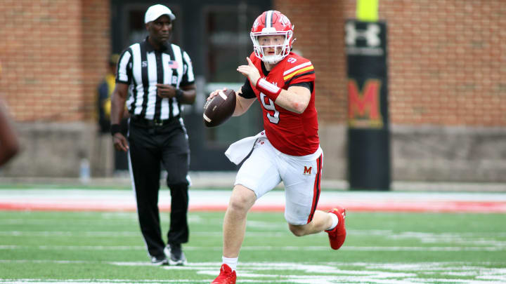 Aug 31, 2024; College Park, Maryland, USA; Maryland Terrapins quarterback Billy Edwards Jr. (9) signals to a receiver during the second quarter against the Connecticut Huskies at SECU Stadium. Mandatory Credit: Daniel Kucin Jr.-USA TODAY Sports
