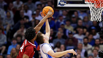 Mar 29, 2025; Newark, NJ, USA; Alabama Crimson Tide forward Mouhamed Dioubate (10) blocks the shot of Duke Blue Devils forward Cooper Flagg (2) during the second half in the East Regional final of the 2025 NCAA tournament at Prudential Center. Mandatory Credit: Vincent Carchietta-Imagn Images