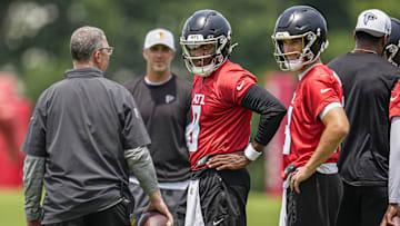 Jun 11, 2025; Atlanta, GA, USA; Atlanta Falcons quarterbacks Michael Penix Jr. (9) and  Kirk Cousins (18)on the field during Minicamp practice at Children's Healthcare of Atlanta Training Ground. Mandatory Credit: Dale Zanine-Imagn Images