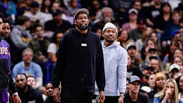 Oct 13, 2024; Denver, Colorado, USA; Phoenix Suns forward Kevin Durant (35) and guard Bradley Beal (3) look on in the third quarter against the Denver Nuggets at Ball Arena. Mandatory Credit: Isaiah J. Downing-Imagn Images