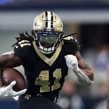 Sep 15, 2024; Arlington, Texas, USA; New Orleans Saints running back Alvin Kamara (41) runs against the Dallas Cowboys in the second half at AT&T Stadium. Mandatory Credit: Tim Heitman-Imagn Images