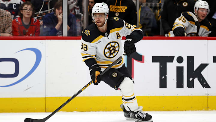 Dec 31, 2024; Washington, District of Columbia, USA; Boston Bruins right wing David Pastrnak (88) skates against the Washington Capitals at Capital One Arena. Mandatory Credit: Peter Casey-Imagn Images