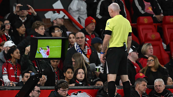 Referee Paul Tierney consulted the pitch-side monitor before making his decision. 