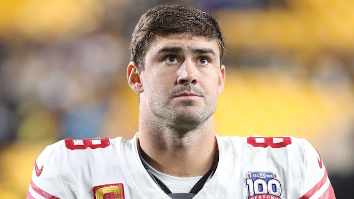 Former Giants quarterback Daniel Jones leaves the field after a loss. Former Giants quarterback Daniel Jones leaves the field after a loss.
