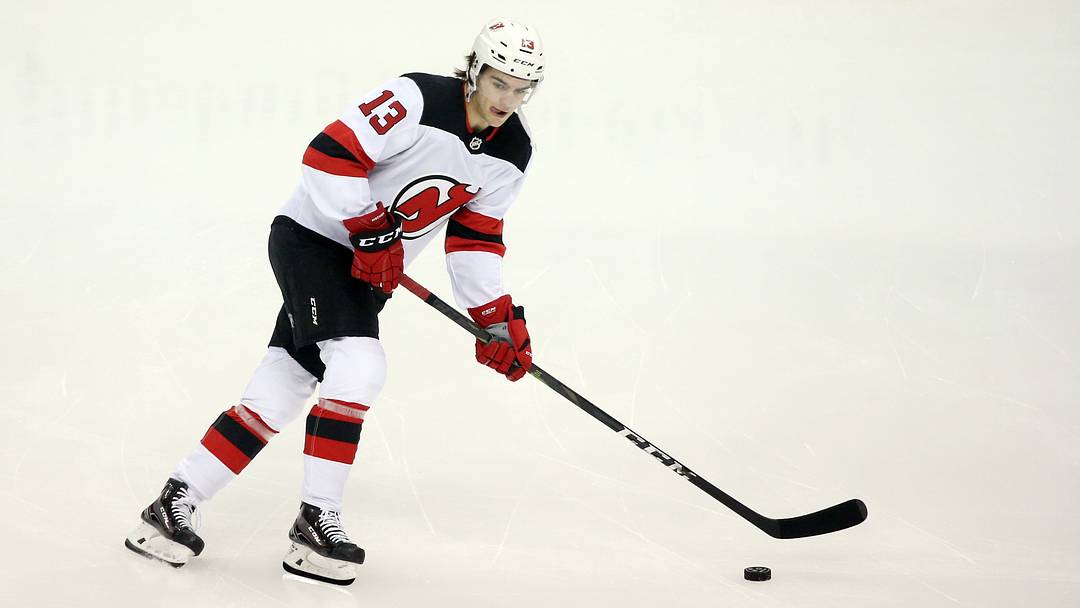 New Jersey Devils center Nico Hischier (13) skates during warm-ups against the Pittsburgh Penguins: Charles LeClaire-USA TODAY Sports