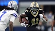 Sep 15, 2024; Arlington, Texas, USA; New Orleans Saints running back Alvin Kamara (41) runs against the Dallas Cowboys in the second half at AT&T Stadium. Mandatory Credit: Tim Heitman-Imagn Images