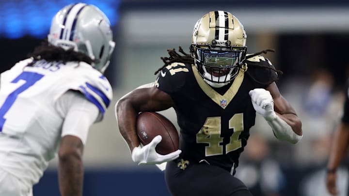 Sep 15, 2024; Arlington, Texas, USA; New Orleans Saints running back Alvin Kamara (41) runs against the Dallas Cowboys in the second half at AT&T Stadium. Mandatory Credit: Tim Heitman-Imagn Images