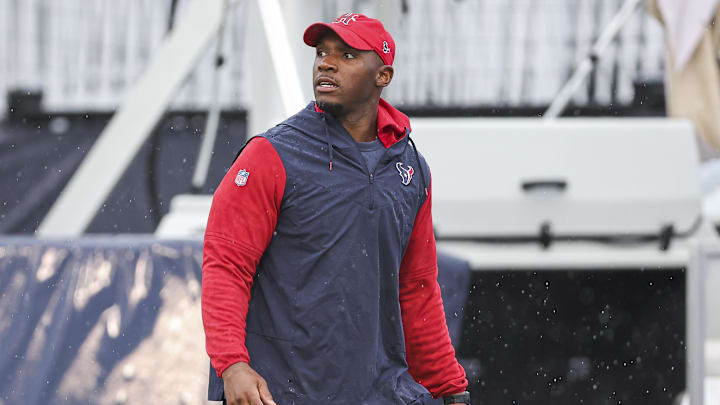 Jul 27, 2024; Houston, TX, USA; Houston Texans head coach DeMeco Ryans walks on the field before training camp at Houston Methodist Training Center. Mandatory Credit: Troy Taormina-Imagn Images