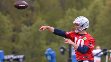 May 11, 2024; Foxborough, MA, USA; New England Patriots quarterback Drake Maye (10) throws a pass at the New England Patriots rookie camp at Gillette Stadium.  Mandatory Credit: Eric Canha-USA TODAY Sports