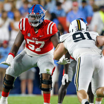 Oct 28, 2023; Oxford, Mississippi, USA; Mississippi Rebels offensive linemen Micah Pettus (57) and Jeremy James (78) block Vanderbilt Commodores defensive linemen Christian James (91) during the first half at Vaught-Hemingway Stadium. Mandatory Credit: Petre Thomas-USA TODAY Sports