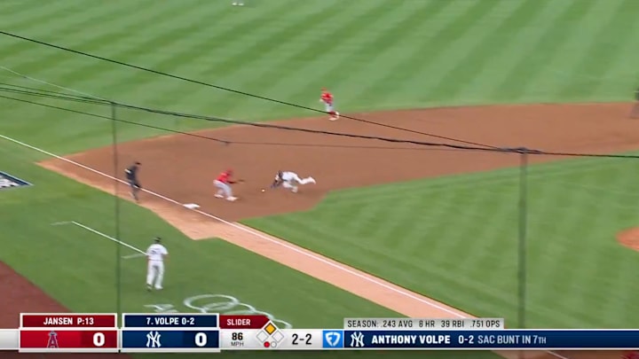Yankees' Dominguez tries to steal third on a hit and run in the bottom of the ninth inning at Yankee Stadium