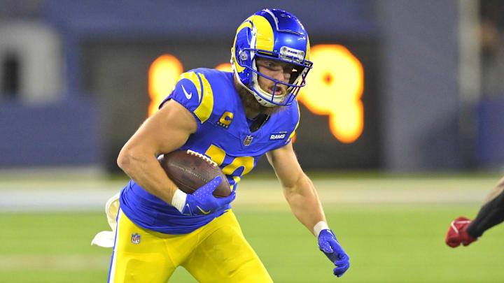 Dec 28, 2024; Inglewood, California, USA; Los Angeles Rams wide receiver Cooper Kupp (10) gains 10 yards on a pass play before he is stopped by Arizona Cardinals cornerback Sean Murphy-Bunting (23) in the first half at SoFi Stadium.