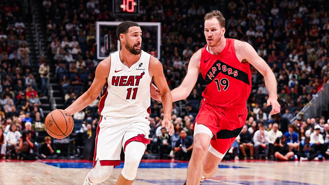 Oct 3, 2026; Quebec City, Quebec, CAN; Miami Heat guard Klay Thompson (11) dribbles the ball against Toronto Raptors center Jakob Poeltl (19) during the first quarter at Videotron Centre. Mandatory Credit: David Kirouac-Imagn Images Oct 3, 2026; Quebec City, Quebec, CAN; Miami Heat guard Klay Thompson (11) dribbles the ball against Toronto Raptors center Jakob Poeltl (19) during the first quarter at Videotron Centre. Mandatory Credit: David Kirouac-Imagn Images