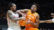 Mar 30, 2025; Indianapolis, IN, USA; Houston Cougars guard Emanuel Sharp (21) steals the ball from Tennessee Volunteers guard Chaz Lanier (2) in the second half during the Midwest Regional final of the 2025 NCAA tournament at Lucas Oil Stadium. Mandatory Credit: Trevor Ruszkowski-Imagn Images