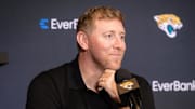 Apr 25, 2025; Jacksonville, FL, USA; Jacksonville Jaguars head coach Liam Coen talks to the media during a press conference to introduce first round draft pick Travis Hunter (not pictured) at Miller Electric Center. Mandatory Credit: Travis Register-Imagn Images