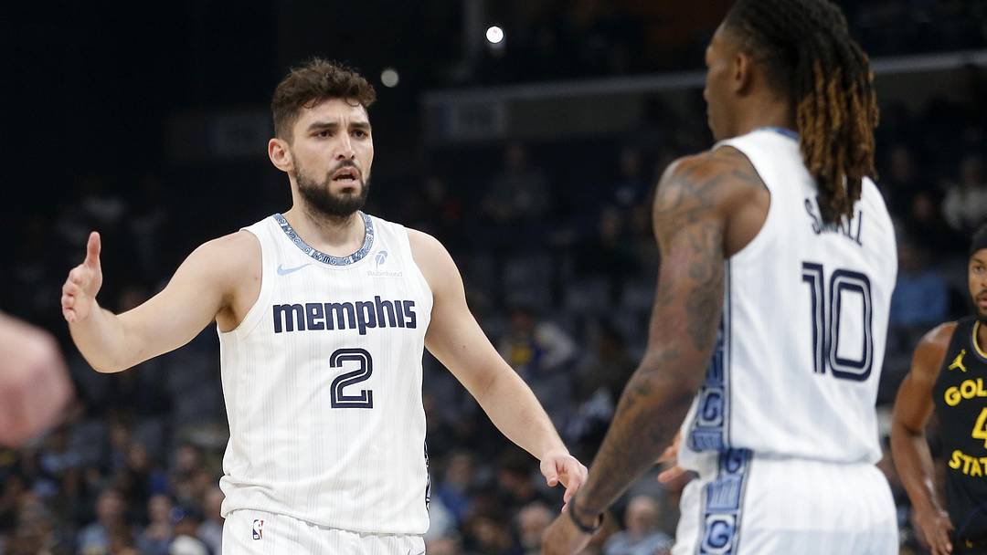 Feb 25, 2026; Memphis, Tennessee, USA; Memphis Grizzlies guard Ty Jerome (2) reacts with guard Javon Small (10) during the first quarter against the Golden State Warriors at FedExForum. Feb 25, 2026; Memphis, Tennessee, USA; Memphis Grizzlies guard Ty Jerome (2) reacts with guard Javon Small (10) during the first quarter against the Golden State Warriors at FedExForum.