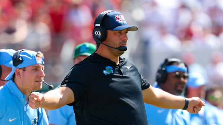 Sep 14, 2024; Norman, Oklahoma, USA;  Tulane Green Wave head coach Jon Sumrall reacts during the first half against the Oklahoma Sooners at Gaylord Family-Oklahoma Memorial Stadium.