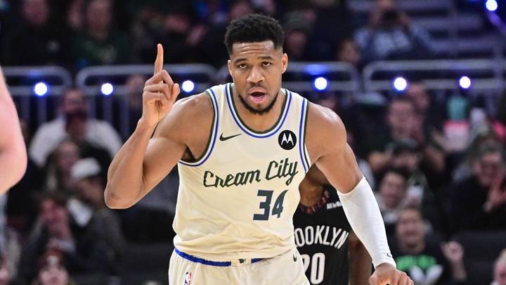 Nov 29, 2025; Milwaukee, Wisconsin, USA; Milwaukee Bucks forward Giannis Antetokounmpo (34) reacts after scoring his 21,000th career point in the third quarter against the Brooklyn Nets at Fiserv Forum. Mandatory Credit: Benny Sieu-Imagn Images