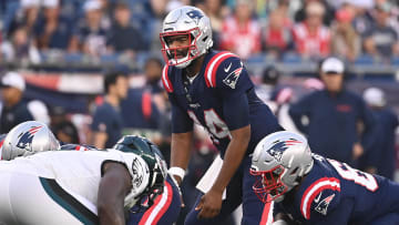 Aug 15, 2024; Foxborough, MA, USA; New England Patriots quarterback Jacoby Brissett (14) works under center during the first half against the Philadelphia Eagles at Gillette Stadium. Mandatory Credit: Eric Canha-USA TODAY Sports