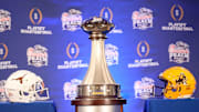 The Peach Bowl trophy on display before a joint news conference with Texas head coach Steve Sarkisian and Arizona State head coach Kenny Dillingham.