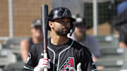 Arizona Diamondbacks shortstop Jordan Lawlar (10) prepares to bat against the Cleveland Guardians during a spring training game at Salt River Fields on Feb. 24, 2025.