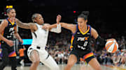 Phoenix Mercury forward Satou Sabally (0) is defended by Las Vegas Aces guard Tiffany Mitchell (3) during the third quarter at PHX Arena Jun 29, 2025.