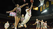 Arizona State guard Trayanna Crisp (4) puts a shot up against Washington State guard Jenna Villa (34) during Pac-12 play at Desert Financial Arena on Feb. 18, 2024.
