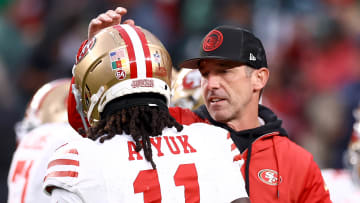 San Francisco 49ers wide receiver Brandon Aiyuk (L) and head coach Kyle Shanahan (R)