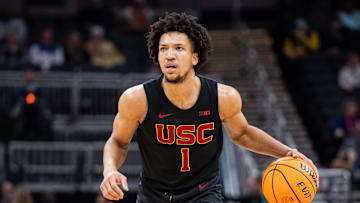 Mar 12, 2025; Indianapolis, IN, USA; USC Trojans guard Desmond Claude (1) dribbles the ball in the first half against the Rutgers Scarlet Knights at Gainbridge Fieldhouse. Mandatory Credit: Trevor Ruszkowski-Imagn Images