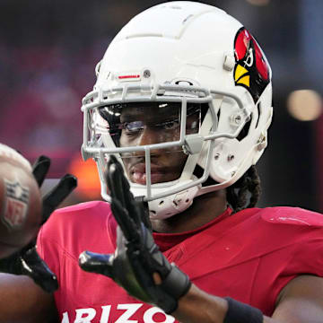 Arizona Cardinals wide receiver Marvin Harrison Jr. (18) warms up against the New York Jets during the second quarter at State Farm Stadium in Glendale on Nov. 10, 2024.