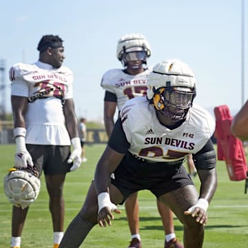 Arizona State defensive linemen MyKeil Gardner (93), left, and Jacob Rich Kongaika (98) train during football practice at Kajikawa practice fields in Tempe on Aug 1, 2025.