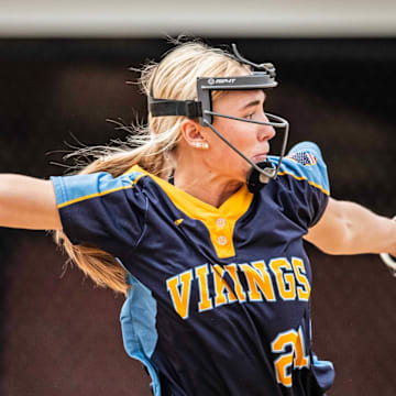 Cape Henlopen senior Abigail Marsh (21) winds up for the pitch against William Penn during the softball game at William Penn in New Castle, Saturday, March 29, 2024. Cape Henlopen won 23-1.