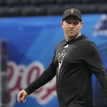 Dillingham walks the field prior to the Chick-fil-A Peach Bowl.