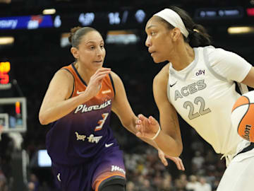 Phoenix Mercury guard Diana Taurasi (3) defends against Las Vegas Aces center A'ja Wilson (22) during the first quarter at Footprint Center on Sept. 1, 2024, in Phoenix.