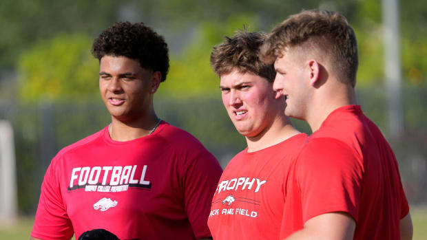 Jorden Cunningham, left, Anderson Kopp, center, and Logan Powell anchor the imposing Brophy Prep (Arizona) offensive line.