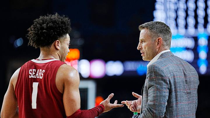 Alabama guard Mark Sears (1) talks with head coach Nate Oats during the Final Four semifinal game against Connecticut at State Farm Stadium.