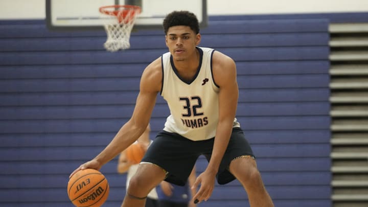 Perry's Koa Peat warms up during practice at Perry High School gym in Gilbert on Nov. 13, 2024.
