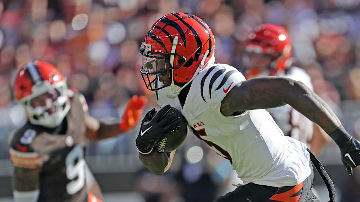 Cincinnati Bengals wide receiver Tee Higgins (5) runs in for a touchdown after a catch during the second half of an NFL football game at Huntington Bank Field, Sunday, Oct. 20, 2024, in Cleveland, Ohio.