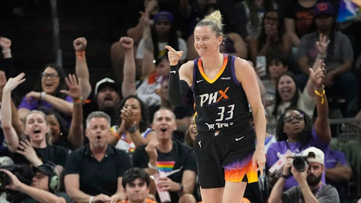 Phoenix Mercury guard Sami Whitcomb (33) points after a three point basket against the Las Vegas Aces during the first quarter at PHX Arena Jun 29, 2025. Phoenix Mercury guard Sami Whitcomb (33) points after a three point basket against the Las Vegas Aces during the first quarter at PHX Arena Jun 29, 2025.