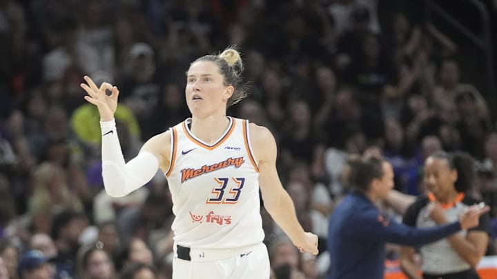Phoenix Mercury guard Sami Whitcomb (33) celebrates after a three point basket against the Dallas Wings during the second quarter at PHX Arena on July 7, 2025.